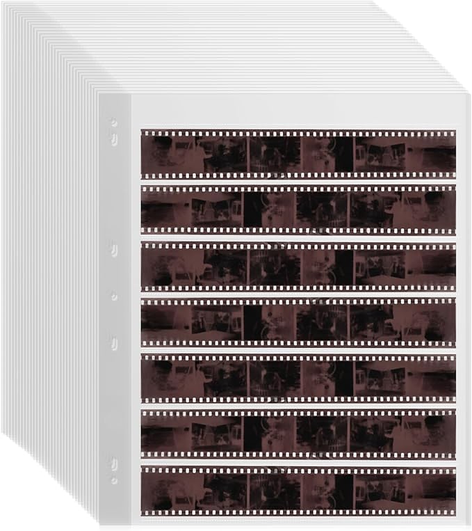 100 Pcs 35mm Film Negative Sleeves Film Negative Storage Presentation Materials 35mm Size Negative Pages Holds Seven Strips of Six Frames Help You Collect and Organize Film