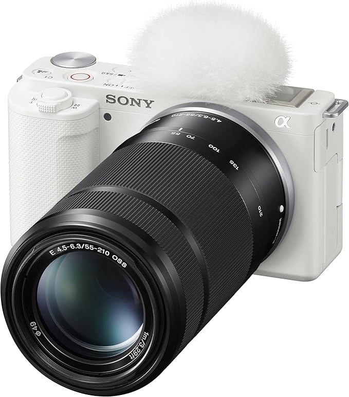 Sony ZV-E10 Mirrorless Alpha APS-C Vlog Camera 2 Lens Kit 16-50mm + 55-210mm ILCZV-E10L/W White Bundle with Deco Gear Case + Filter Set + Wide Angle & Telephoto Lenses + Extra Battery & Accessories