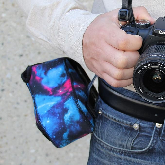USA Gear Camera Sleeve (Medium) for Compact SLRs Compatible with Canon EOS R100 Nikon Z30 Sony ZV-E10, and more - Padded Neoprene DSLR Case with Zipper Accessory Pocket & Belt Loop (Galaxy)