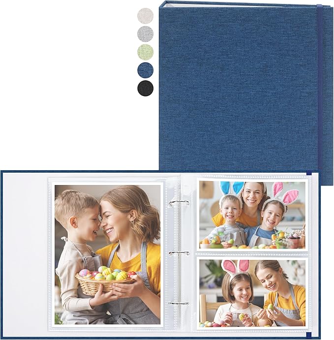 Blue vintage-style photo album with elastic band, displaying family photos in plastic sleeves.